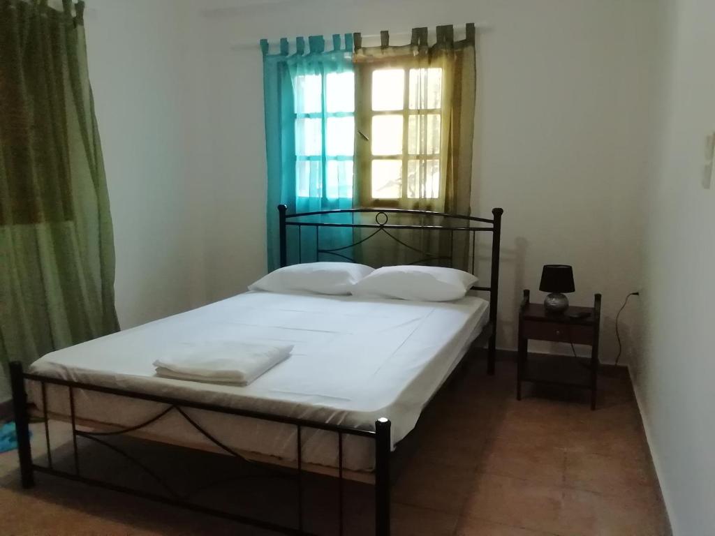 Katil atau katil-katil dalam bilik di Maro House
