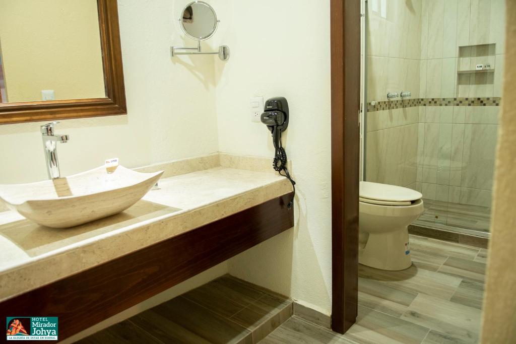 Koupelna v ubytování Mirador Johya Hotel