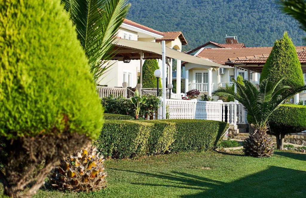 Zahrada ubytování Larimar Suite Hotel