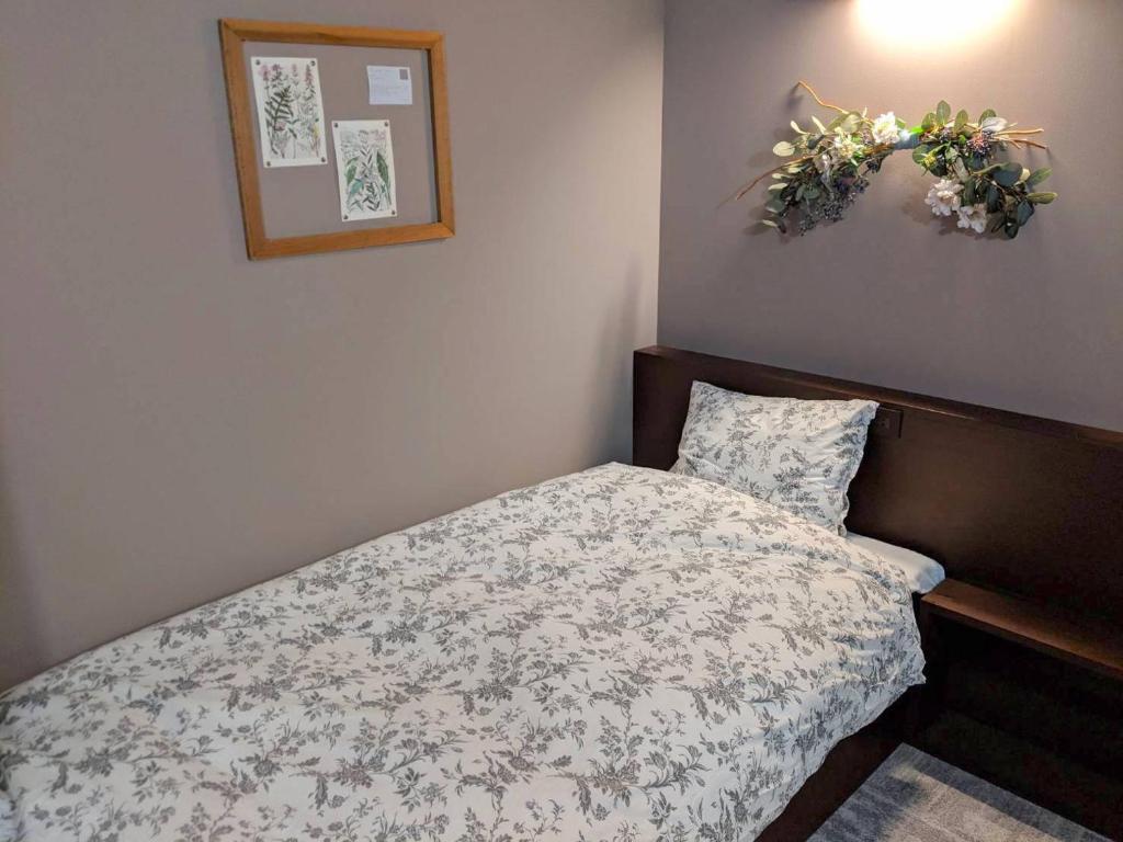 Postel nebo postele na pokoji v ubytování Hotel Trim