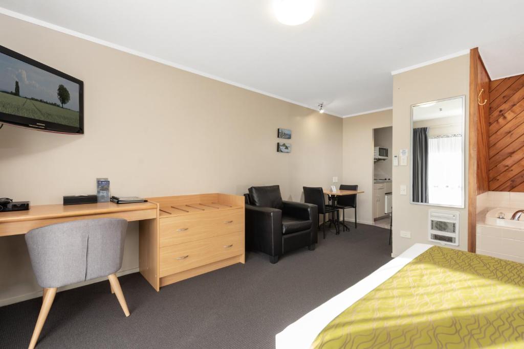 ASURE Macy's Motor Inn - Resim 9