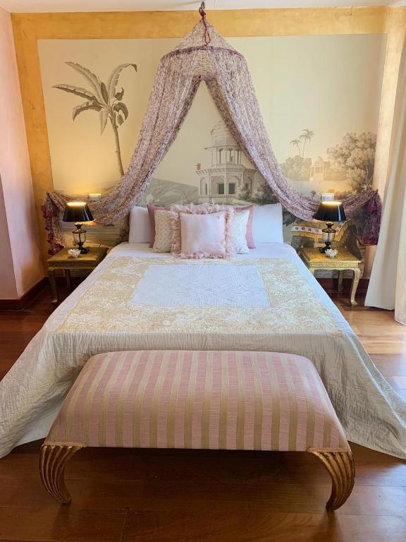Postel nebo postele na pokoji v ubytování Hotel Boutique Valle de Oca