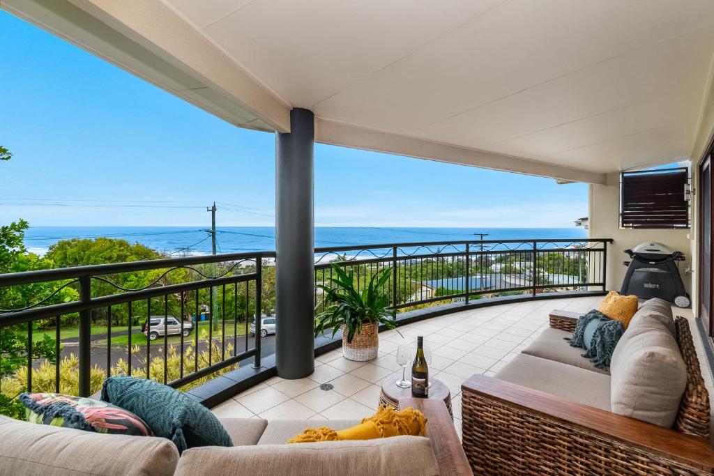 a living room with a view of the ocean at Oceanic Blue - East Ballina in East Ballina