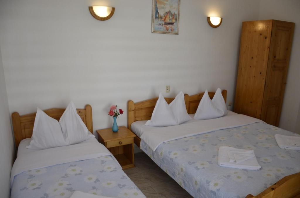 Postel nebo postele na pokoji v ubytování Complex Credo