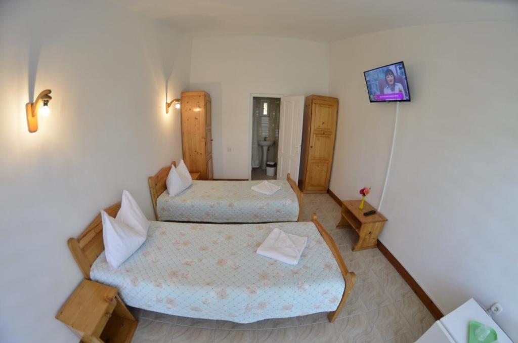 Postel nebo postele na pokoji v ubytování Complex Credo