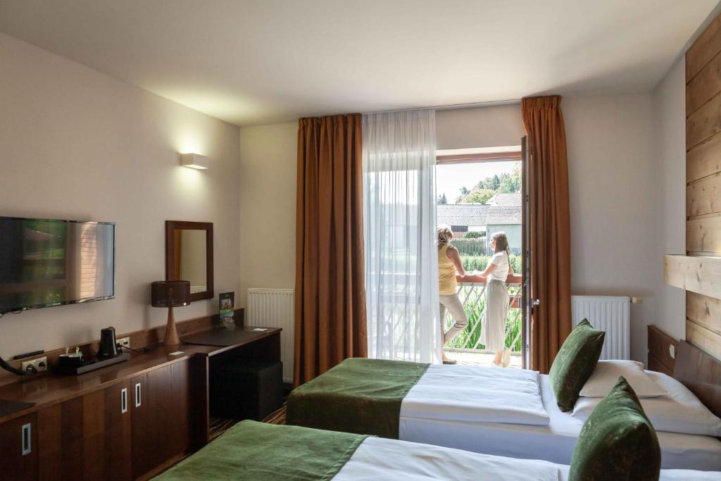 Postel nebo postele na pokoji v ubytování Equitana Hotel Resort