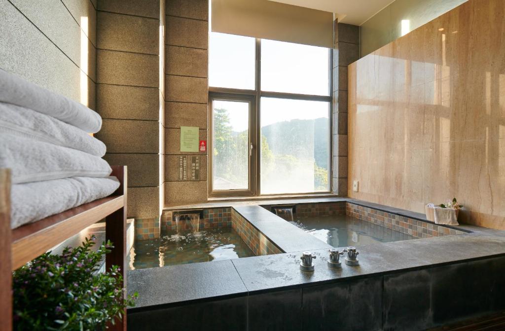 Koupelna v ubytování Reikei Hot Spring Resort