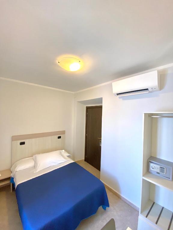Postel nebo postele na pokoji v ubytování Hotel Venezia