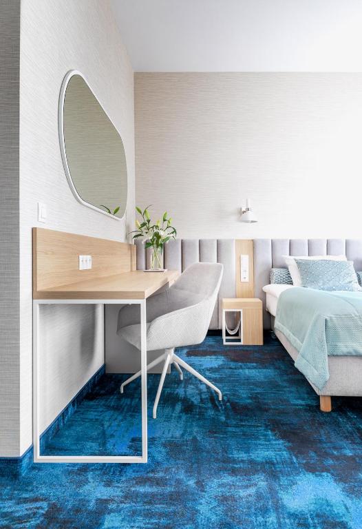 Postel nebo postele na pokoji v ubytování Hotel Morski Widok