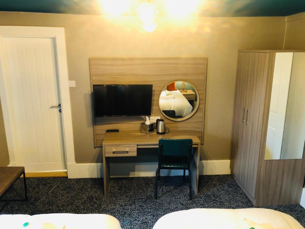 TV a/nebo společenská místnost v ubytování Sligachan Hotel