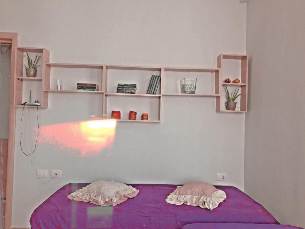 Postel nebo postele na pokoji v ubytování Arianiti Guesthouse