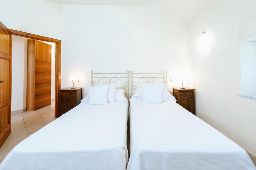 Postel nebo postele na pokoji v ubytování Casa GINESTRA a Bagno Vignoni