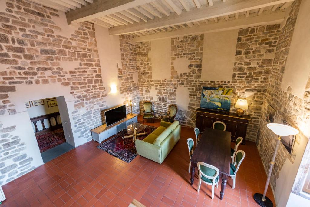 Posedenie v ubytovaní Nella Torre del Poschi Penthouse with Roof Terrace