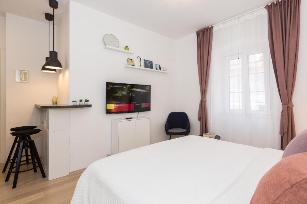 Posteľ alebo postele v izbe v ubytovaní Liberty Town Center Room