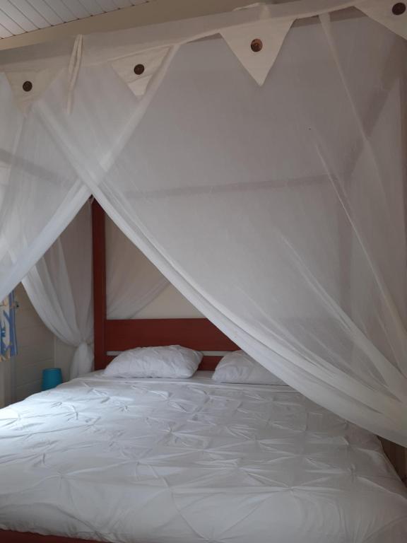 Postel nebo postele na pokoji v ubytování BLUE PARADISE