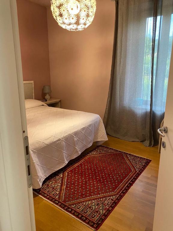 Postel nebo postele na pokoji v ubytování Cascina Patrizia
