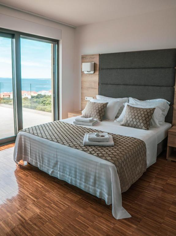 Łóżko lub łóżka w pokoju w obiekcie Luxury Apartments White Villa Violeta