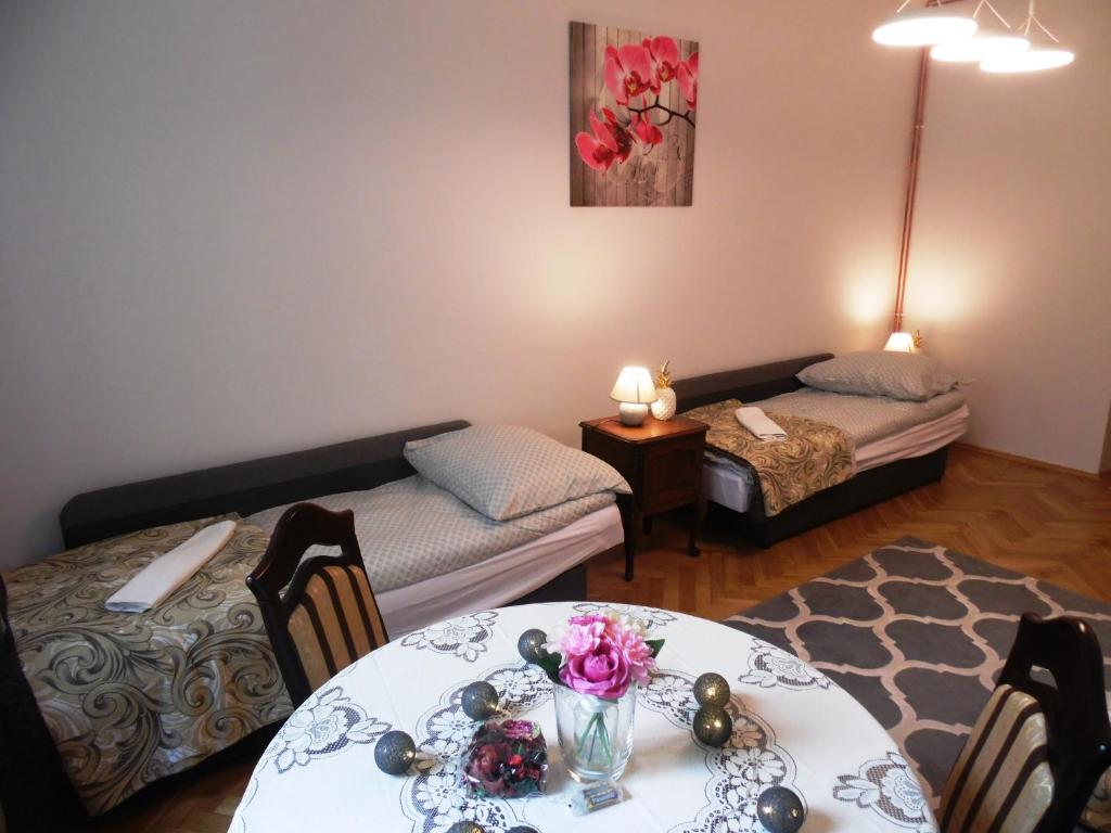 Posedenie v ubytovaní Apartament Orchidea