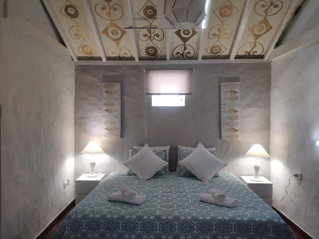 Postel nebo postele na pokoji v ubytování Finca Lomo Grande