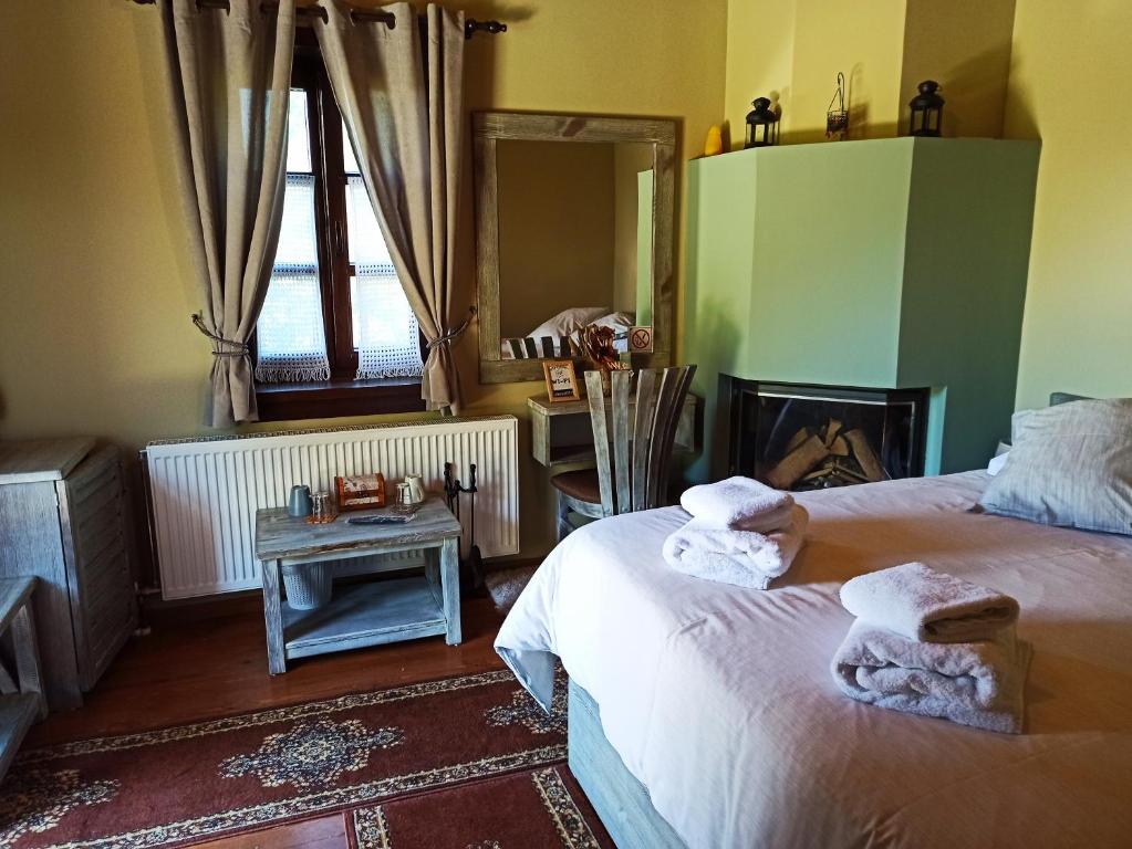Postel nebo postele na pokoji v ubytování Foris House