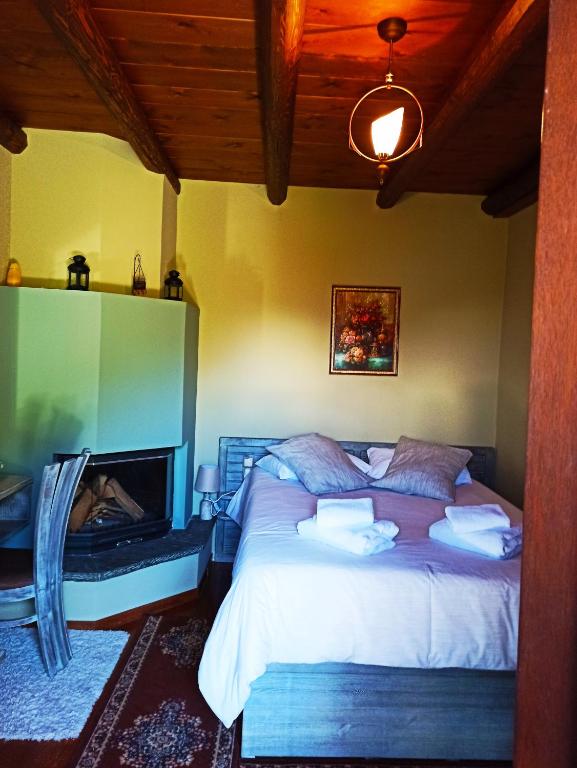Postel nebo postele na pokoji v ubytování Foris House