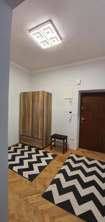 Posteľ alebo postele v izbe v ubytovaní Apartament Orchidea