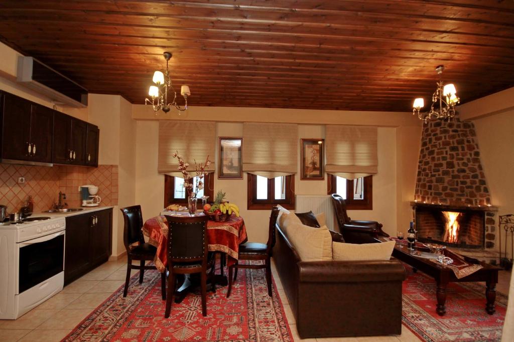 Kuchyň nebo kuchyňský kout v ubytování Menalia Villas & Suites ΚΤΗΜΑ ΚΟΥΜΠΟΥΡΗ