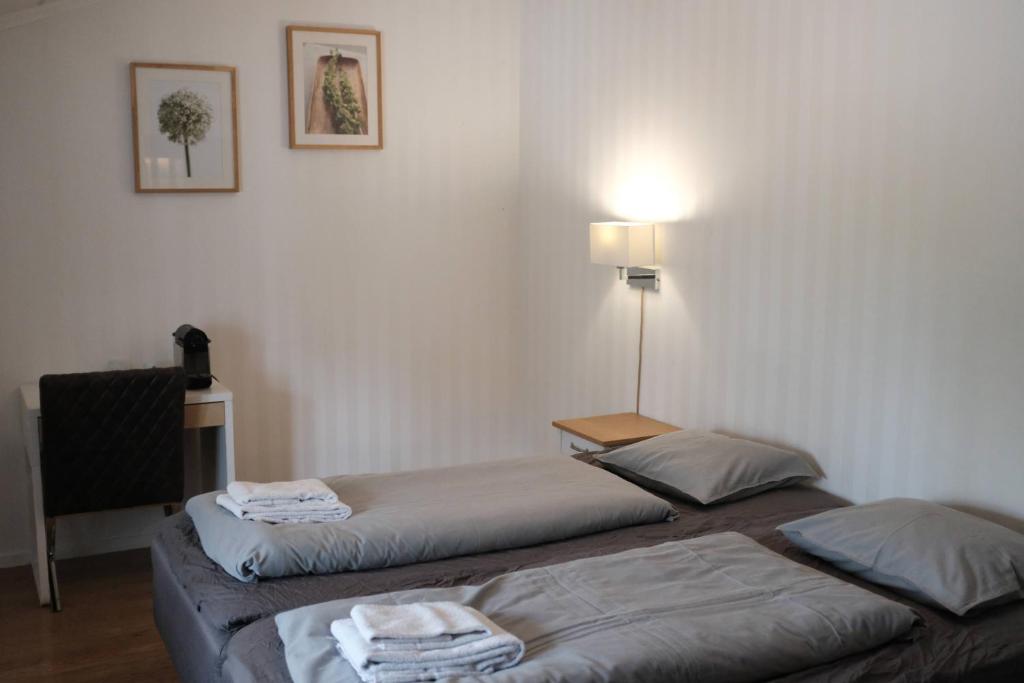 Postel nebo postele na pokoji v ubytování Lapland Lodge