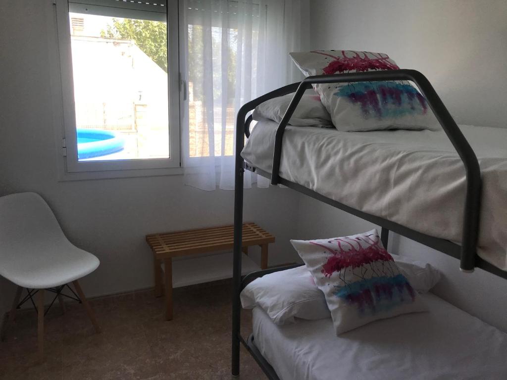 Posteľ alebo postele v izbe v ubytovaní La Caseta del Padri