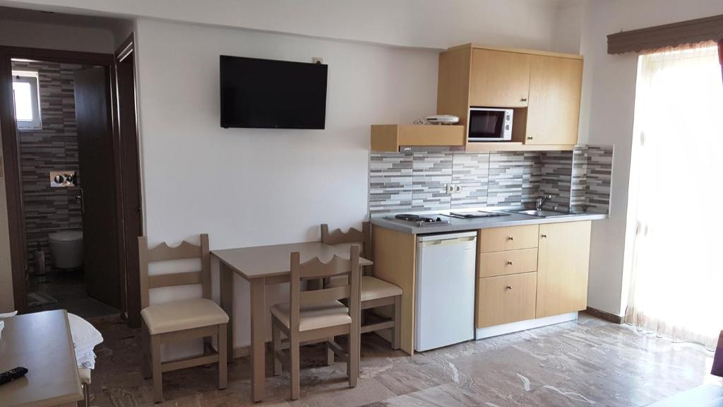 Kuchyň nebo kuchyňský kout v ubytování Luis Apartments