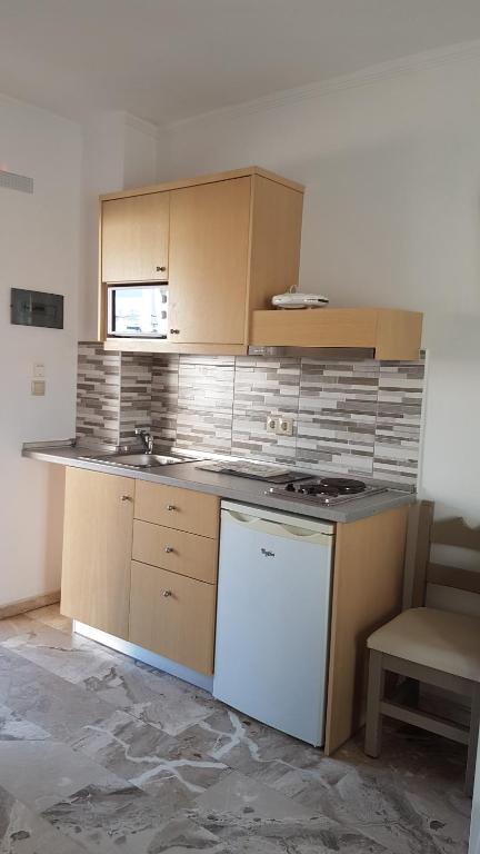 Kuchyň nebo kuchyňský kout v ubytování Luis Apartments