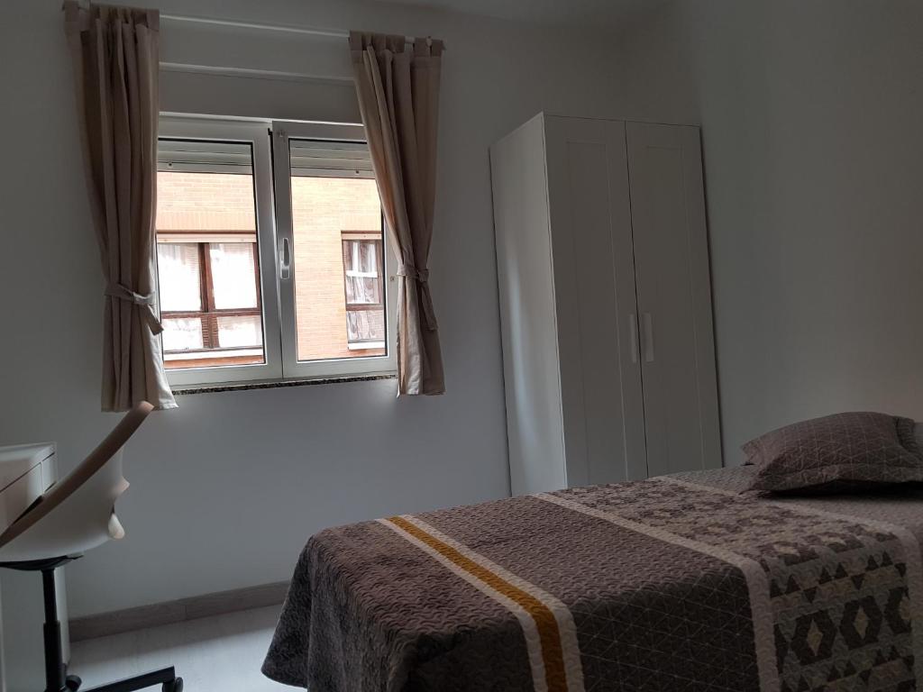 Postel nebo postele na pokoji v ubytování El RiNCoNCiTo De Su