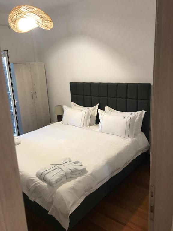 Łóżko lub łóżka w pokoju w obiekcie VILLA FRETTA