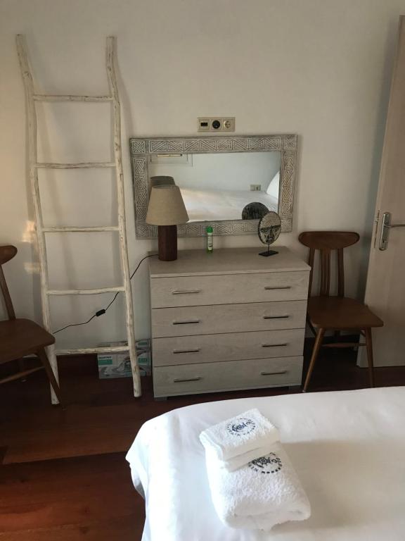Łóżko lub łóżka w pokoju w obiekcie VILLA FRETTA