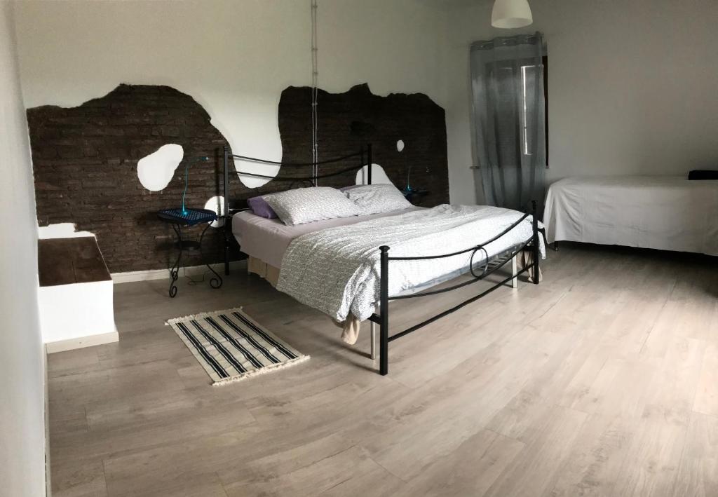 Postel nebo postele na pokoji v ubytování La Torretta