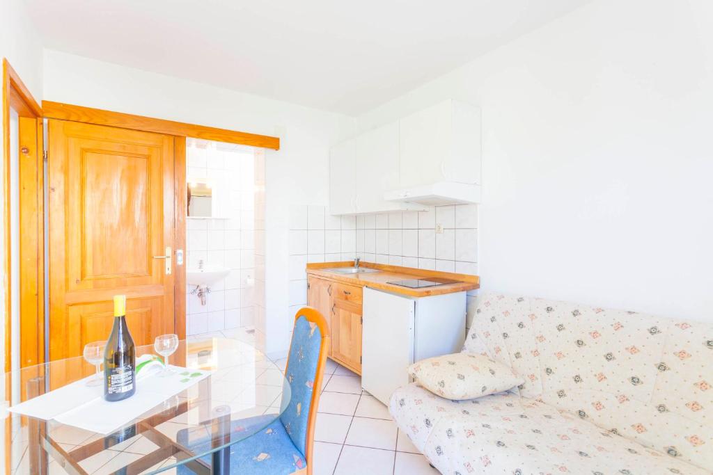 Posedenie v ubytovaní APARTMANI GRBAVAC