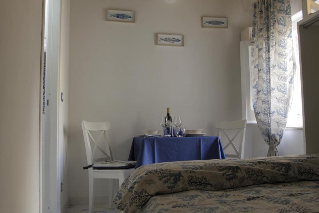 Posteľ alebo postele v izbe v ubytovaní La casa nella Torretta