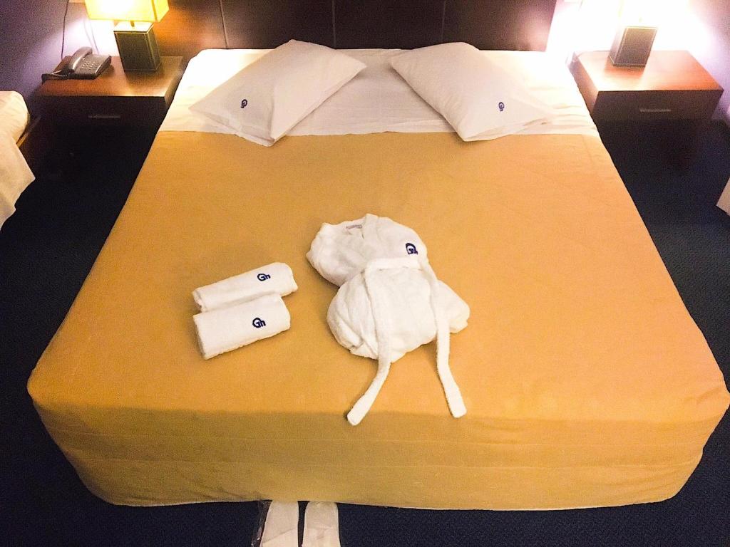 Postel nebo postele na pokoji v ubytování Galini Hotel