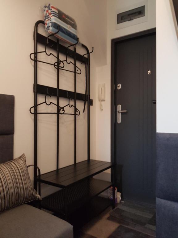 Posteľ alebo postele v izbe v ubytovaní Mikro Apartament Solo na Starówce 8m2