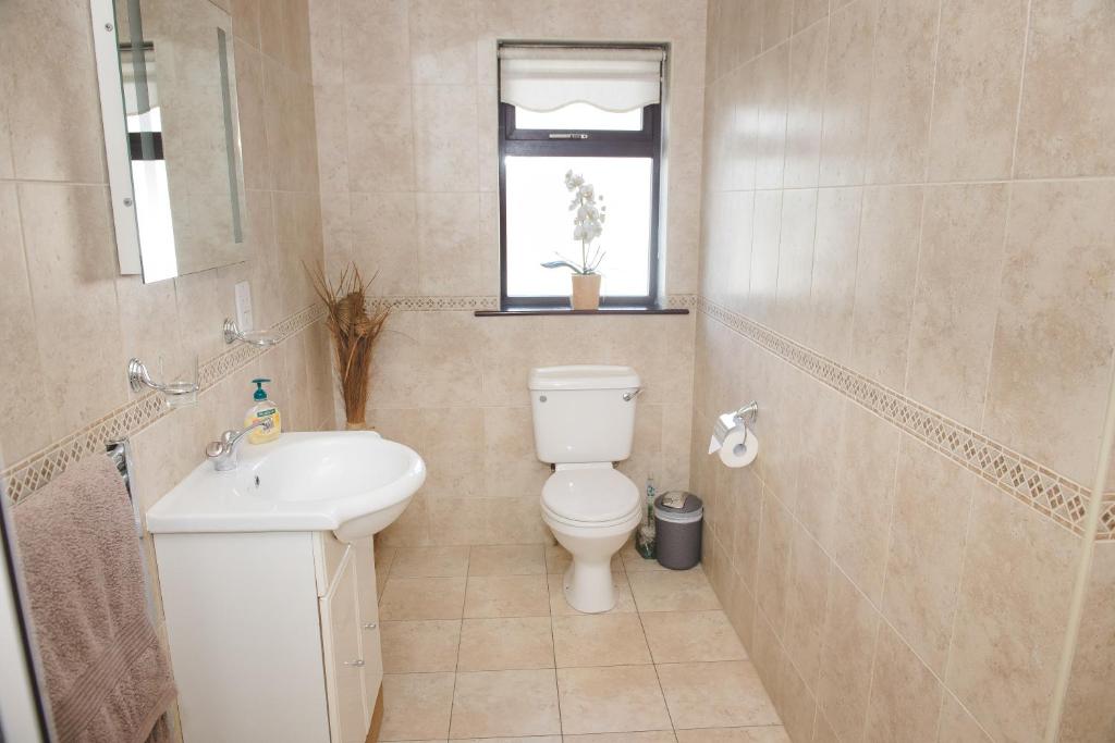 Koupelna v ubytování Kayden House