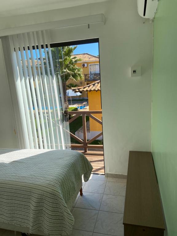  Casa Super Charmosa em Condomínio na Praia