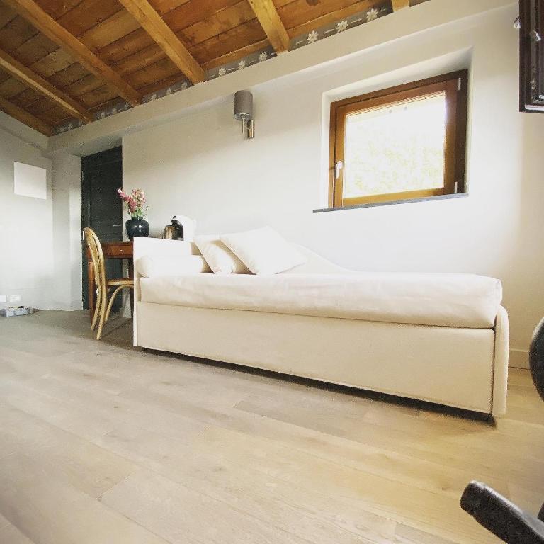 Postel nebo postele na pokoji v ubytování Agriturismo Missanega