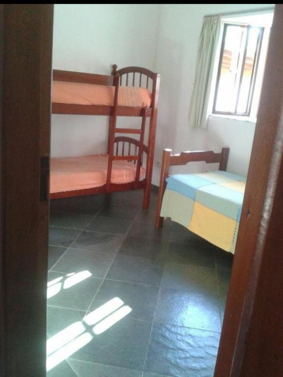  Casa de praia com piscina e churrasqueira