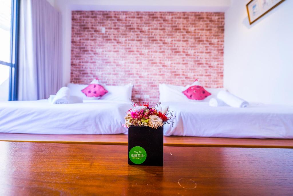 黑琵軼棧湖濱旅宿 K&B Happy Hostel房間的床