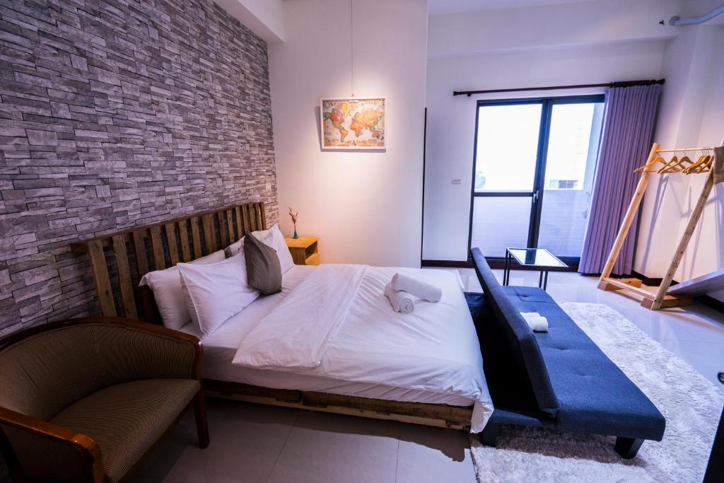 黑琵軼棧湖濱旅宿 K&B Happy Hostel房間的床