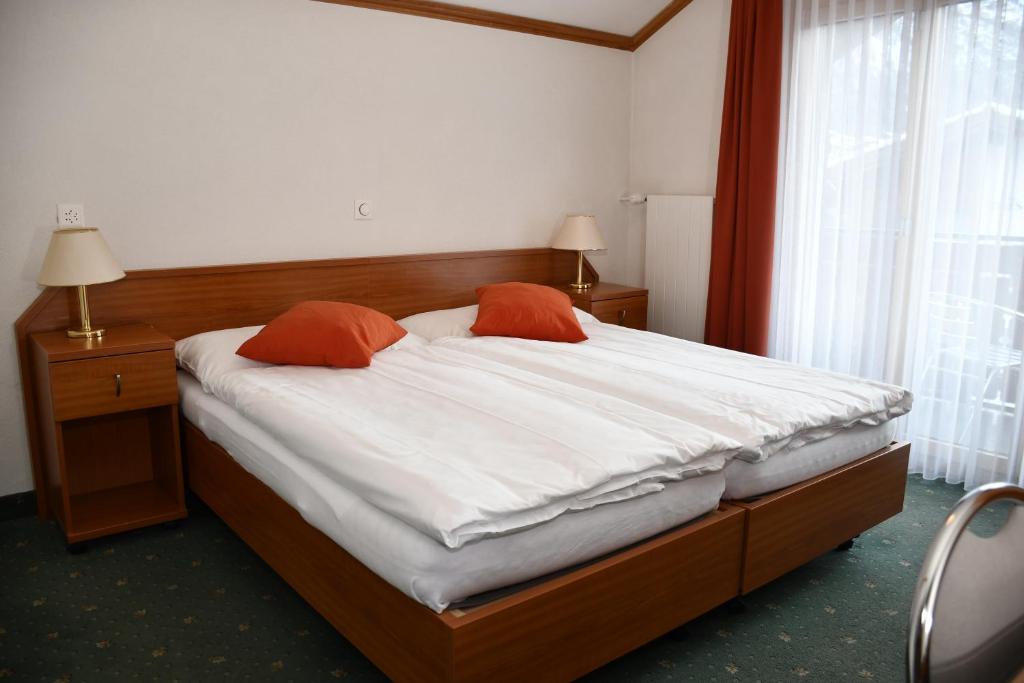 Postel nebo postele na pokoji v ubytování Hotel Elite