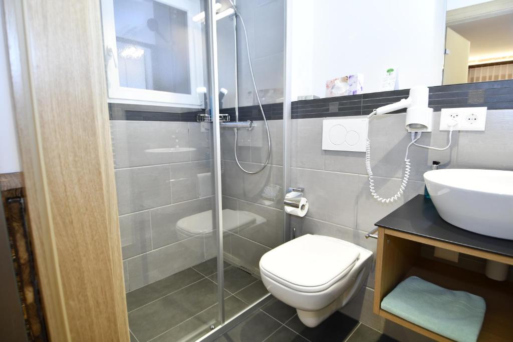 Koupelna v ubytování Hotel Elite