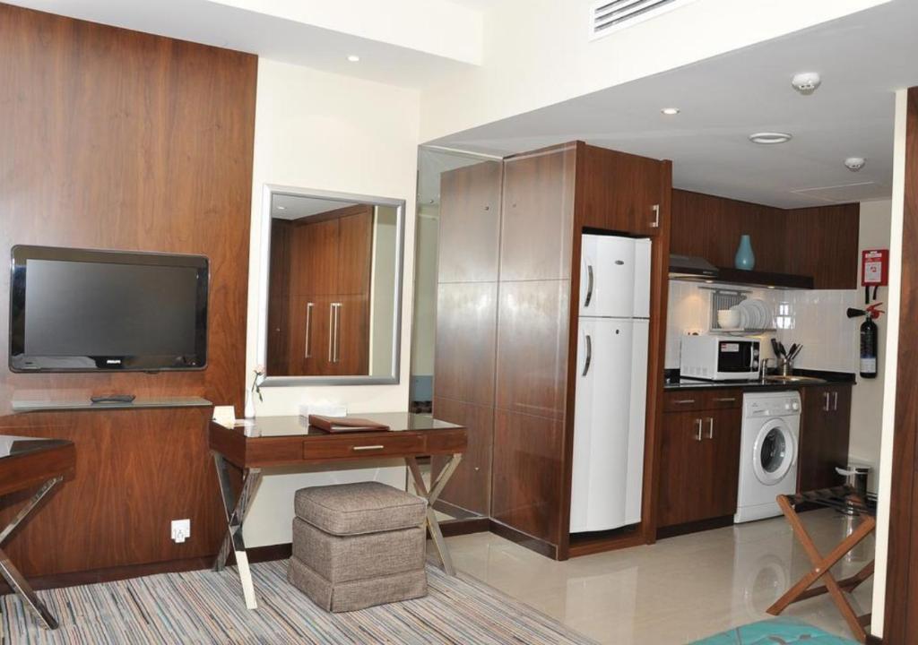 A cozinha ou cozinha compacta de Phoenix Plaza Hotel Apartments