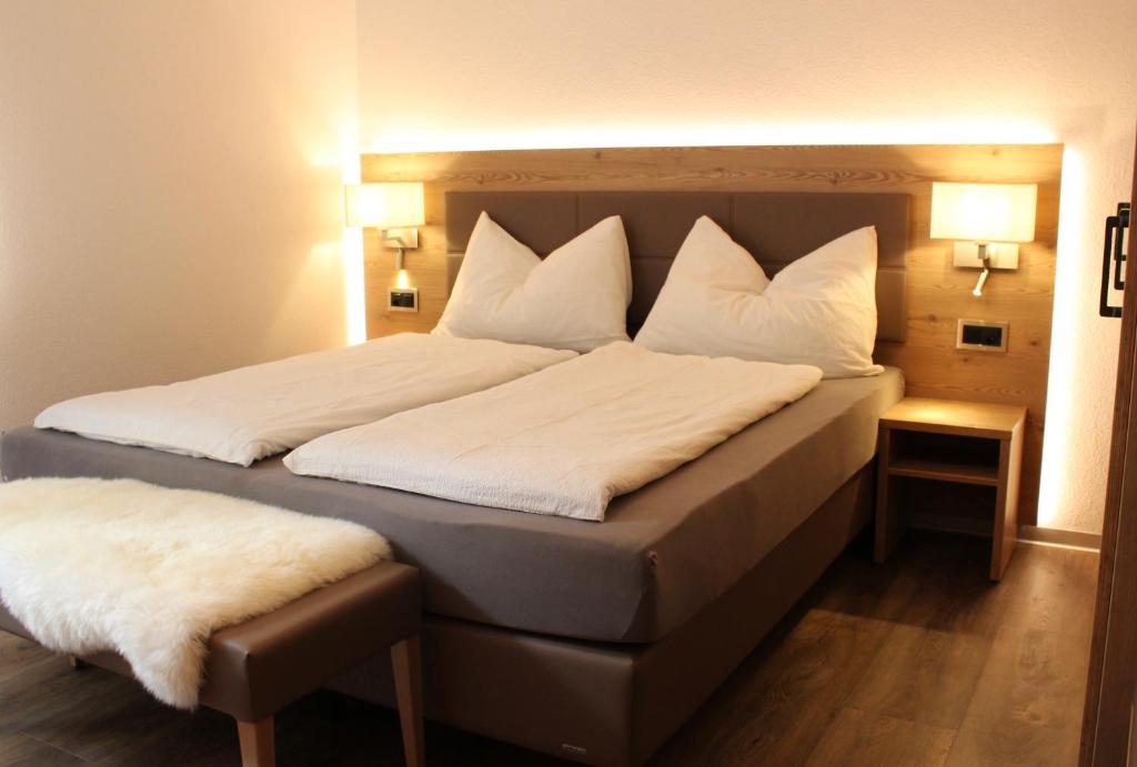 Postel nebo postele na pokoji v ubytování Haus Les Mélèzes C