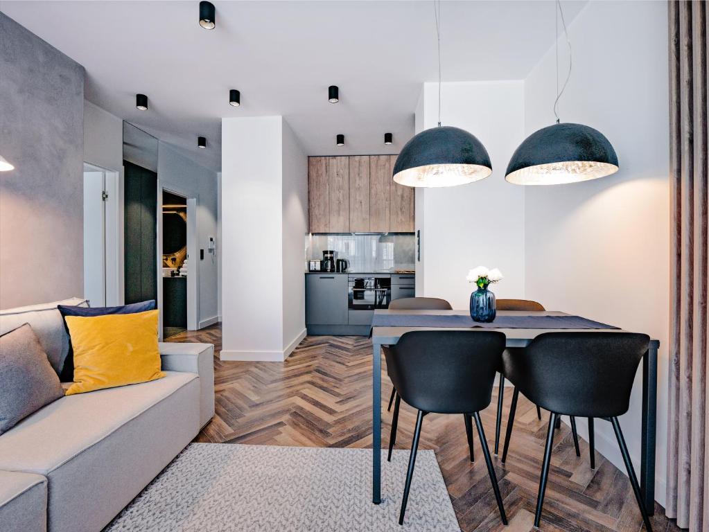 Kuchyňa alebo kuchynka v ubytovaní Apartamenty Homely Place Koziołki - Stary Rynek - Parking